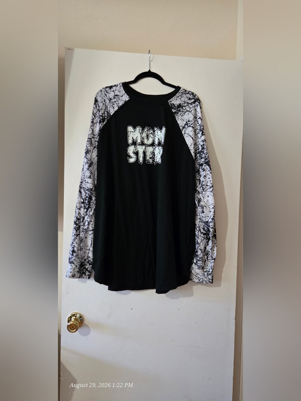 LuLaRoe Erin Black Raglan Long-Sleeve Shirt With Glow In Dark Applique